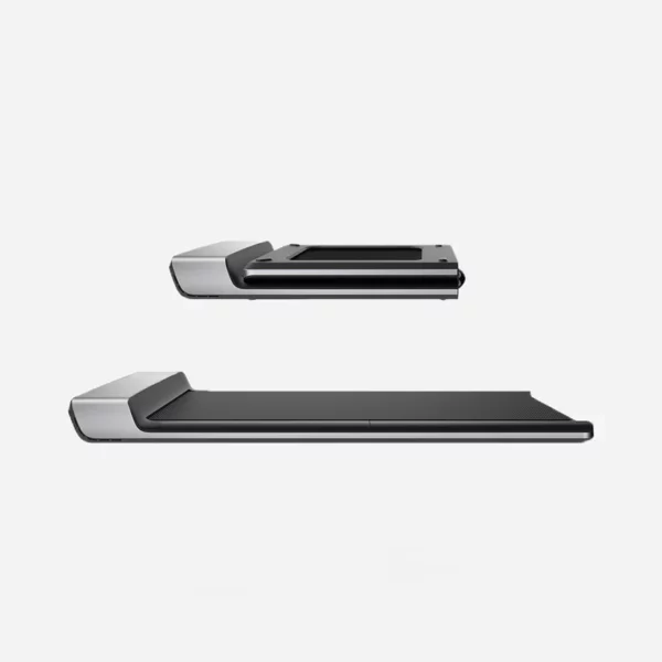 Vue latérale d'un tapis de marche pliable et compact, mettant en avant son design élégant et sa capacité à se plier facilement pour un rangement pratique. Idéal pour optimiser l'espace tout en restant actif au quotidien.